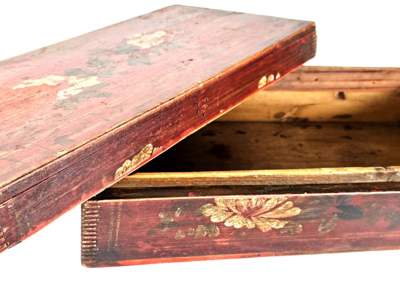 Antique Chinese Red Wooden Chest with Floral Decor 4