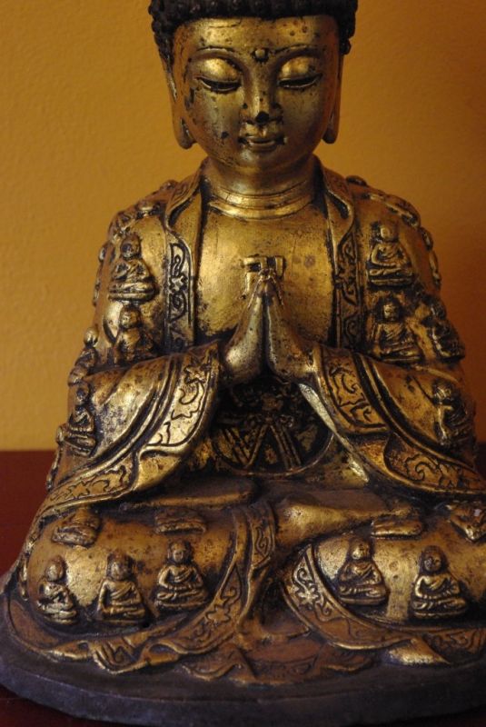 Petite statue de bouddha  en bronze 